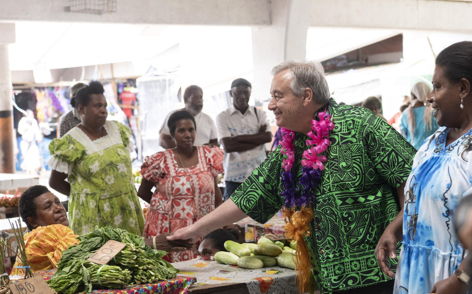 The Secretary Antonio Guterres with Women Market Vendors in Port Vila, Vanuatu