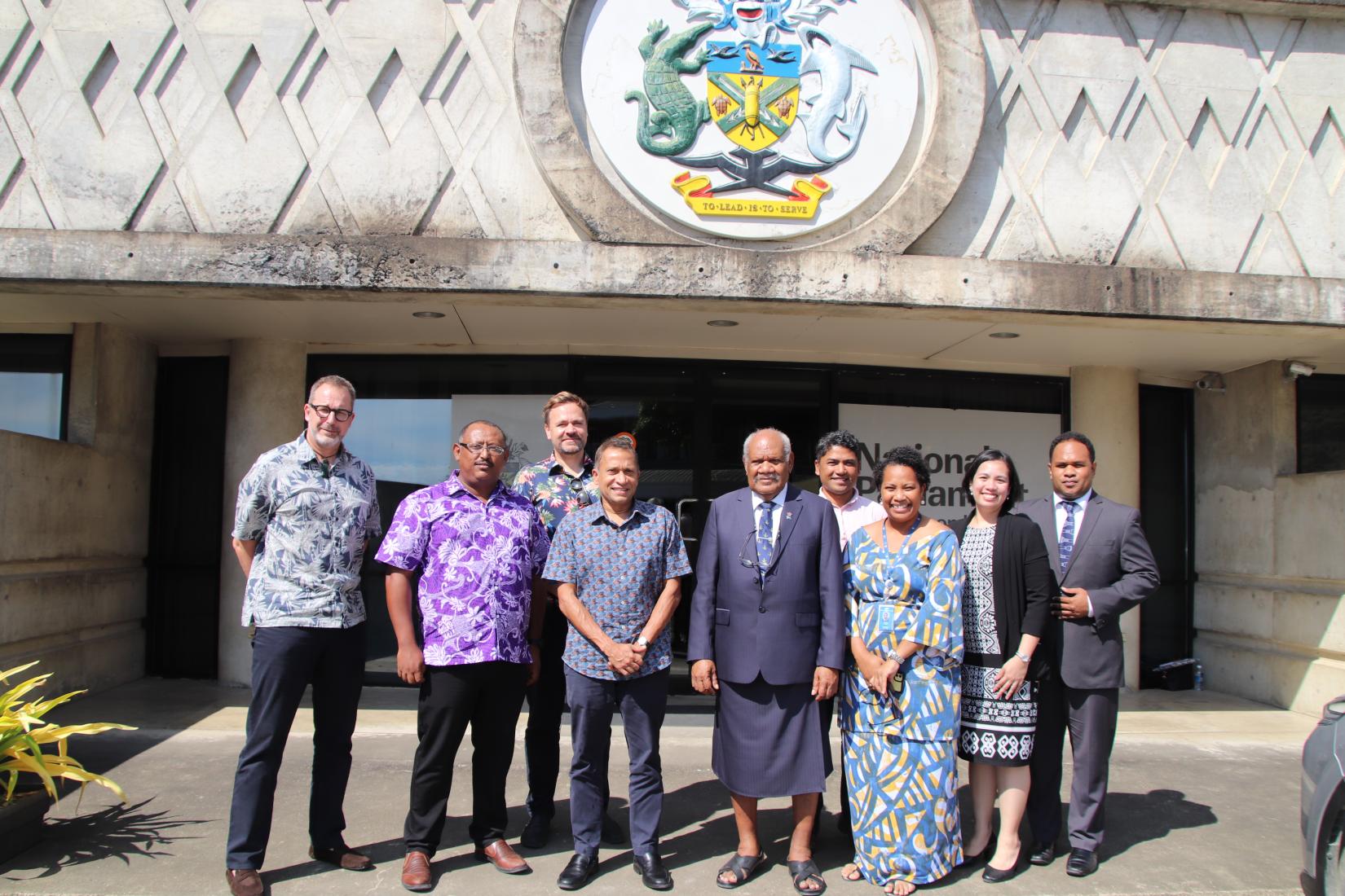 UN staff with the Speaker of  Solomon Islands Parliament , Hon. Patteson Oti