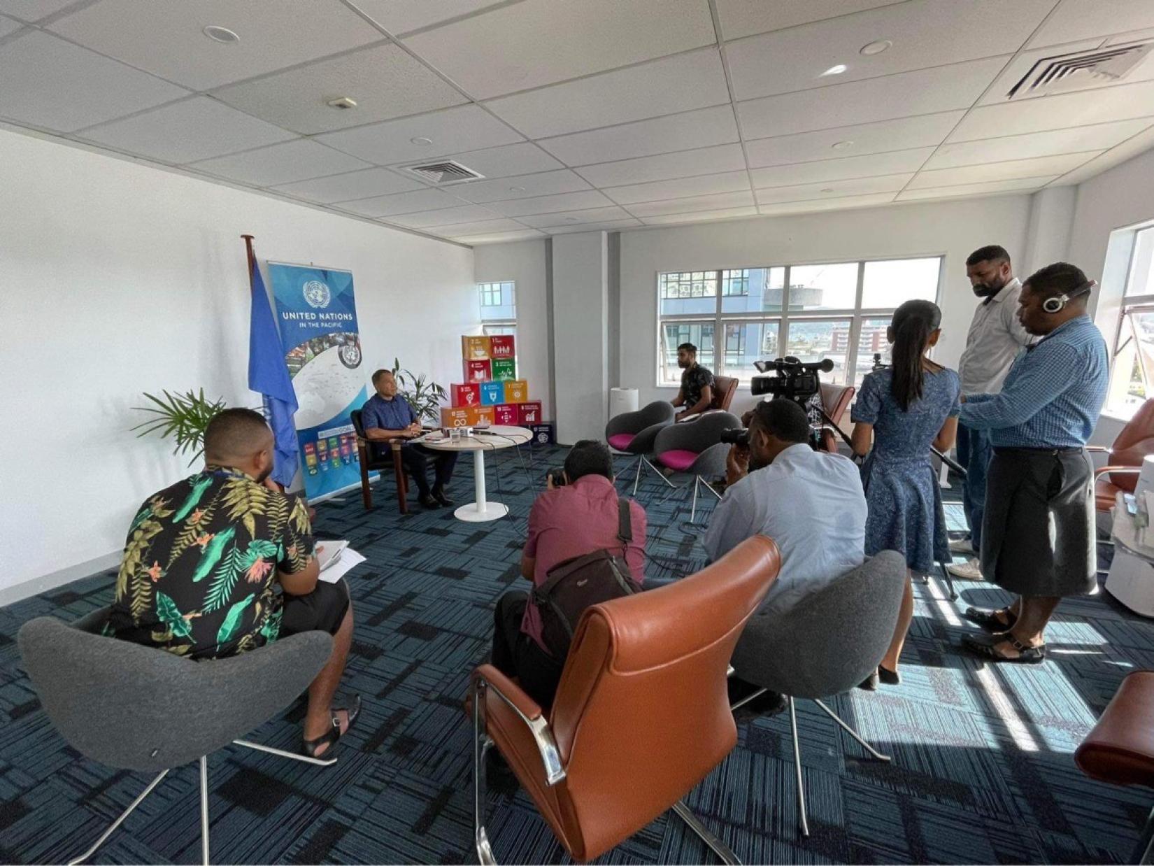 UN Resident Coordinator to Fiji, Solomon Islands, Tonga, Tuvalu and Vanuatu, Sanaka Samarasinha, talks to Fijian journalists in his office in Suva. On Democracy Day, we join hands for freedom, and to protect the rights of all people, everywhere. 