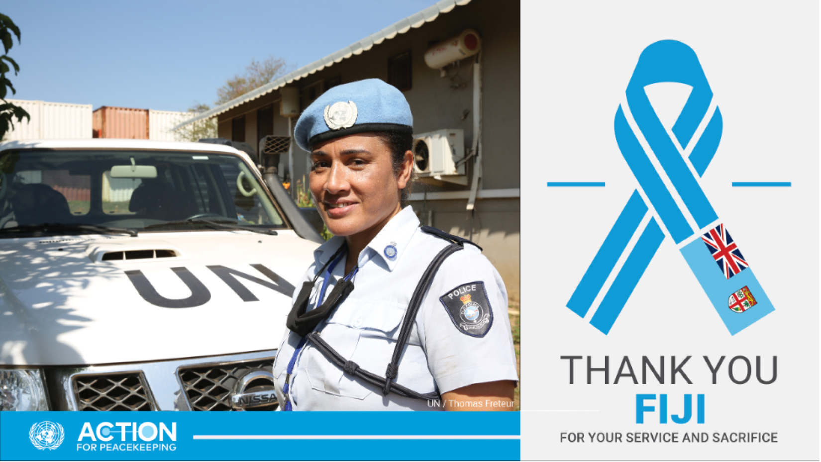 A member of the UN Police, originally from Fiji, serving in South Sudan, smiles at the camera.